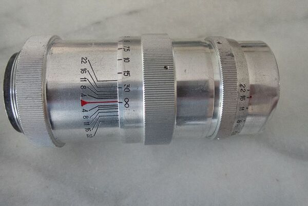 Jupiter 11 Lens. f4 135mm. M39 Screw Mount. Complete with Micro Four Thirds adaptor. Manual focus fixed lens. Tested 12