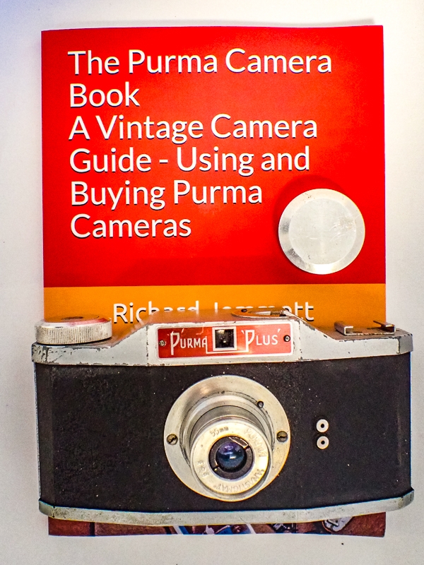 Film Tested Purma Plus Camera with Leather Case. Plus The Purma Camera Book. 3